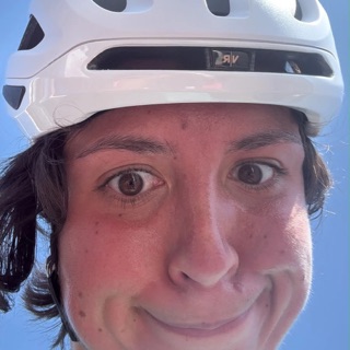 Selfie in a white cycling helmet